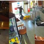 Chaos as MCA is caught on CCTV wielding a knife at customers and staff at a restaurant