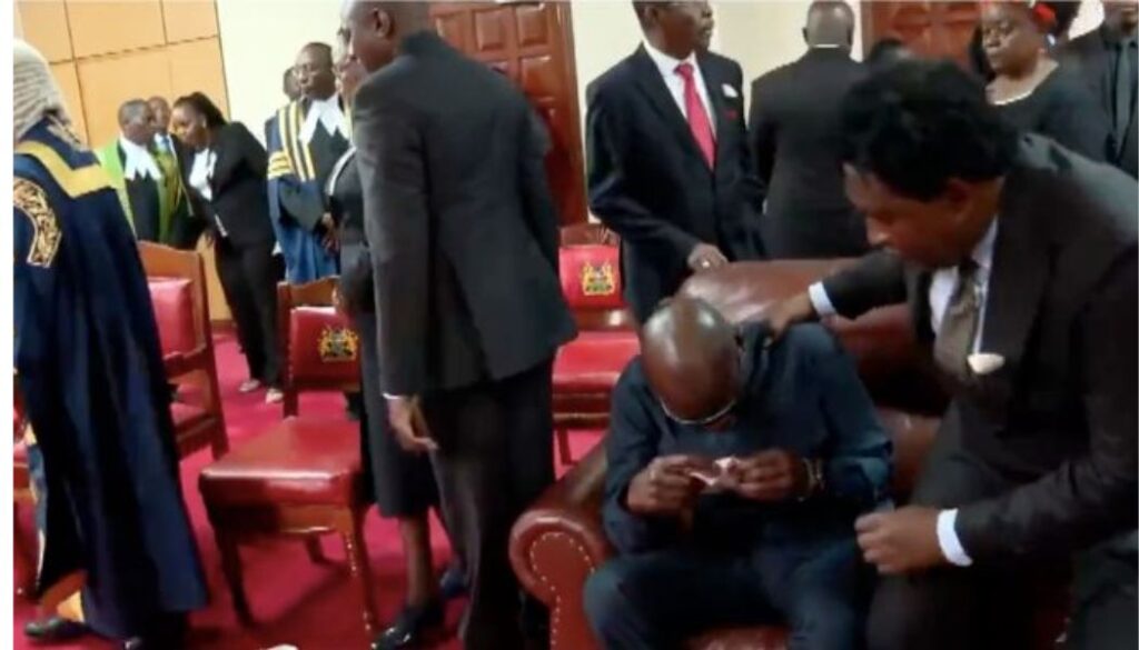 Raila’s bodyguard Maurice Ogeta overwhelmed by grief at Parliament