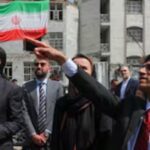 Iran warns it has 'new cards on the battlefield' as Pakistan prepares for possible peace talks.