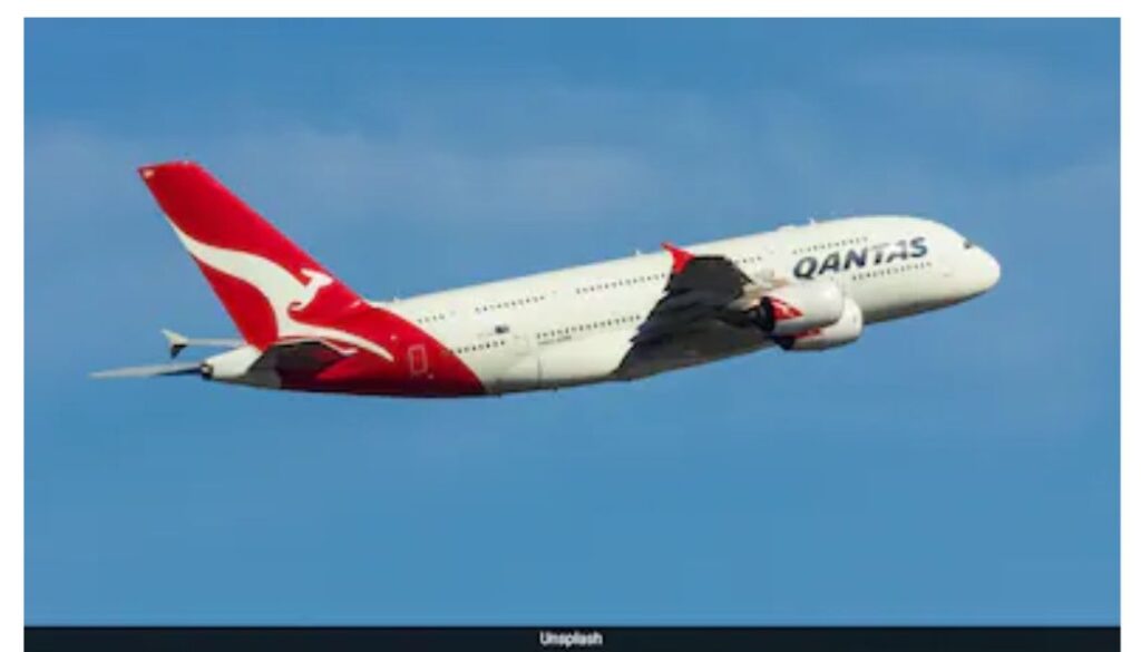 Australia's Qantas was forced to divert a flight bound for the United States over a disruptive passenger, with local media reporting the man bit a flight attendant