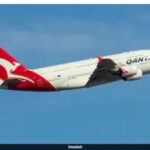 Australia's Qantas was forced to divert a flight bound for the United States over a disruptive passenger, with local media reporting the man bit a flight attendant